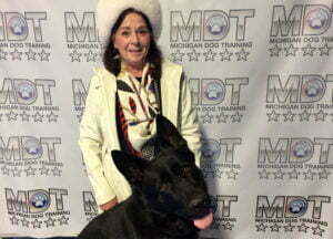 Deborah Buzzy and her dog Odin 