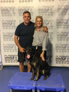 Jeff and Kathy Powers and their dog Oskar, a Lab/Hound