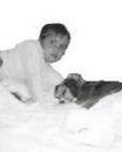 Michael as a child with his first family dog Princess, a Beagle Rat Terrier. When Princess was a younger dog, she taught Michael how to talk